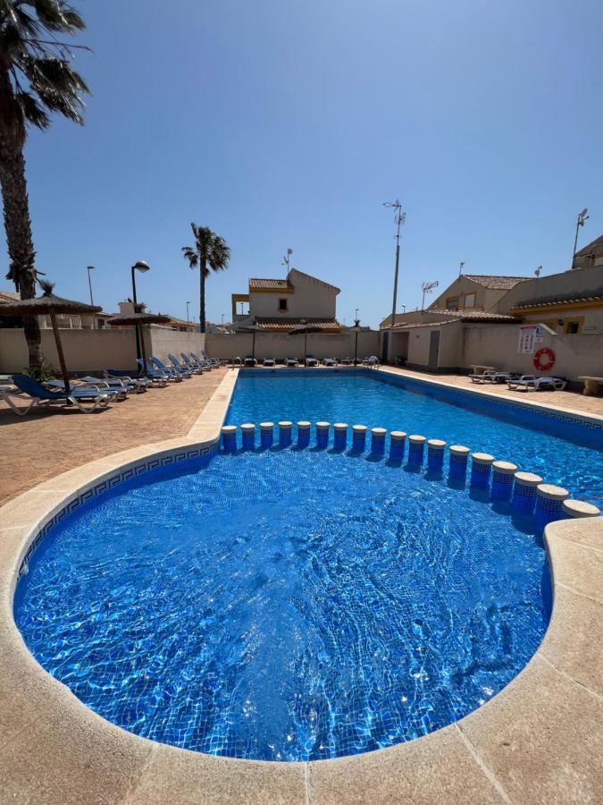 Bonito Adosado Con Piscina A 200 M De La Playa Appartement El Mojon  Buitenkant foto